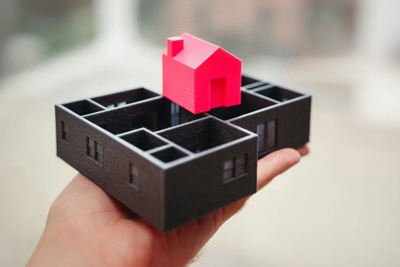 How might intelligent automation revolutionize the construction and real estate industries?