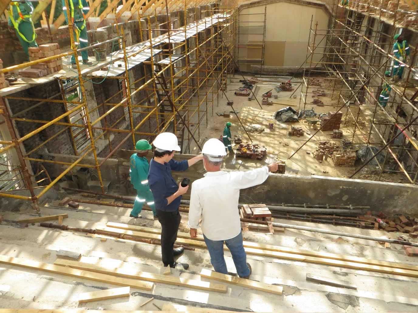 How might technology change the way construction and real estate management operate in the future?