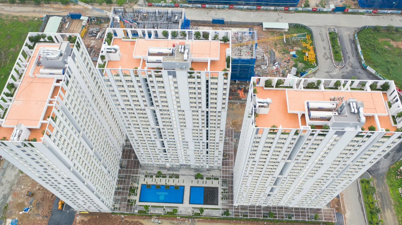 How can the construction and real estate industries utilize technology to expand their businesses?