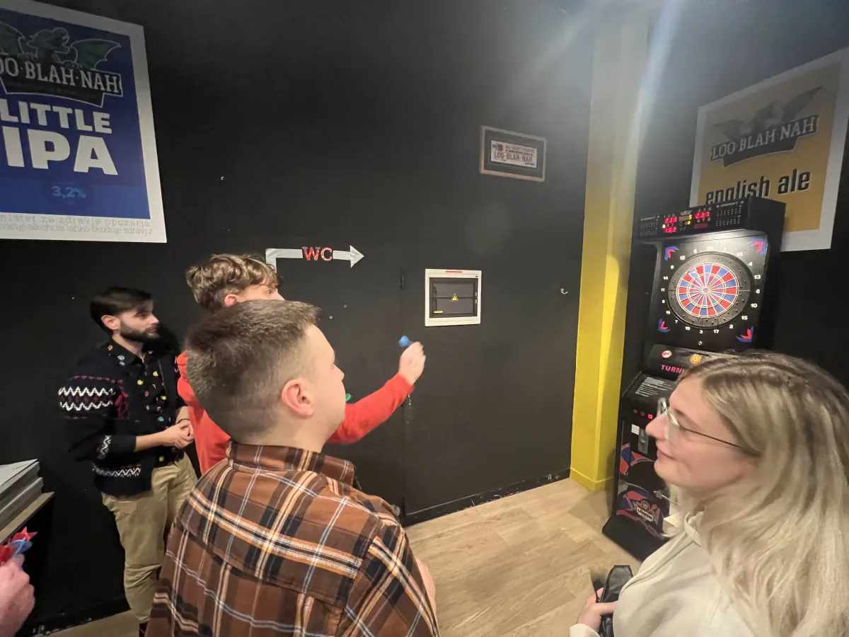 Team playing a video game together